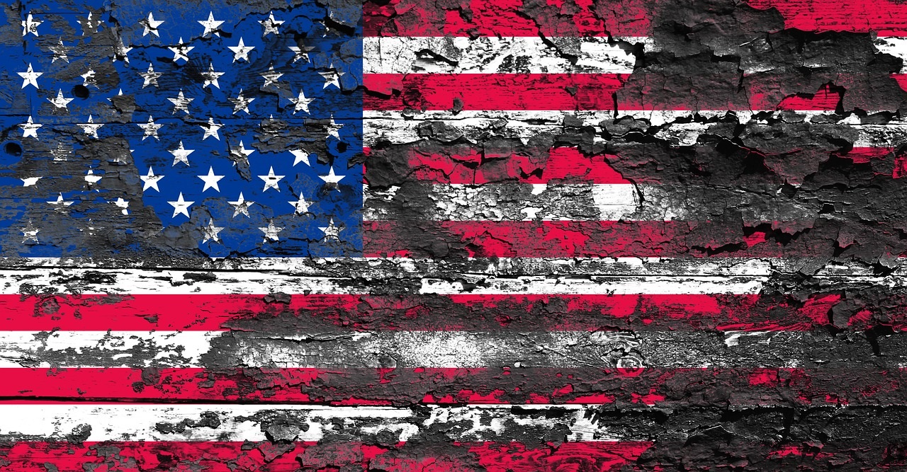An disintegrating American flag